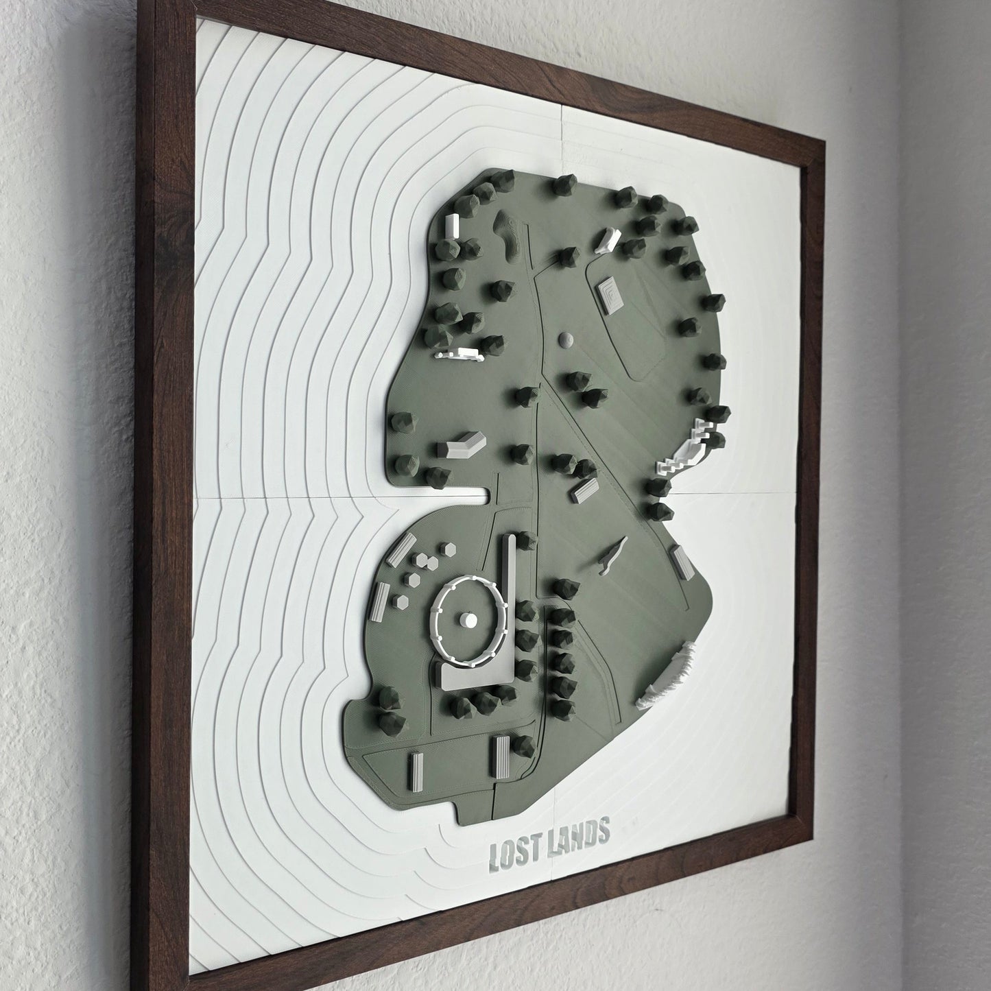 Topographic map model on a gray background