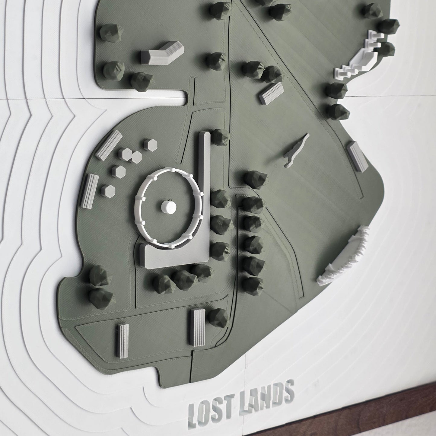 Model of a landscape with trees and roads on a white background