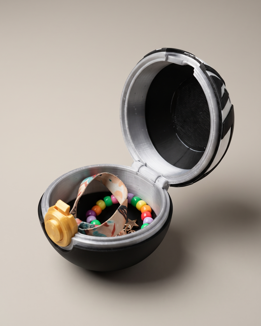 Open Headbanger Memory Capsule with keepsakes inside