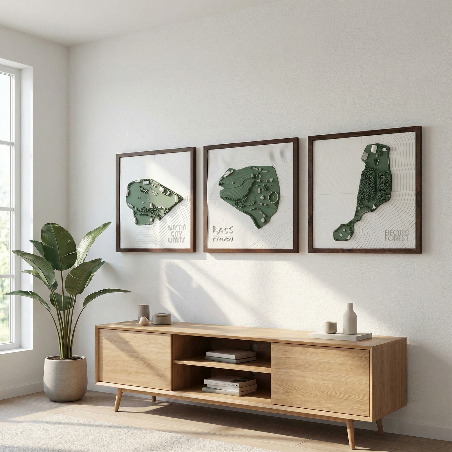 Three festival maps hung on a wall