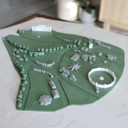 3D model of a park layout with green and white elements on a light surface.