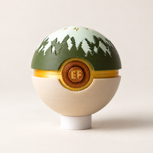 Electric Forest Memory Capsule on a white stand against a warm neutral background